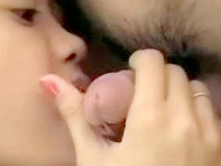 This japanese slut sucks a massive nippon cock in a Tokyo hotel room.
